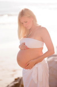 Me pregnant.  With Noah.  I didn't have time for a leisurely maternity beach shoot this time around, but I think I look generally the same. 